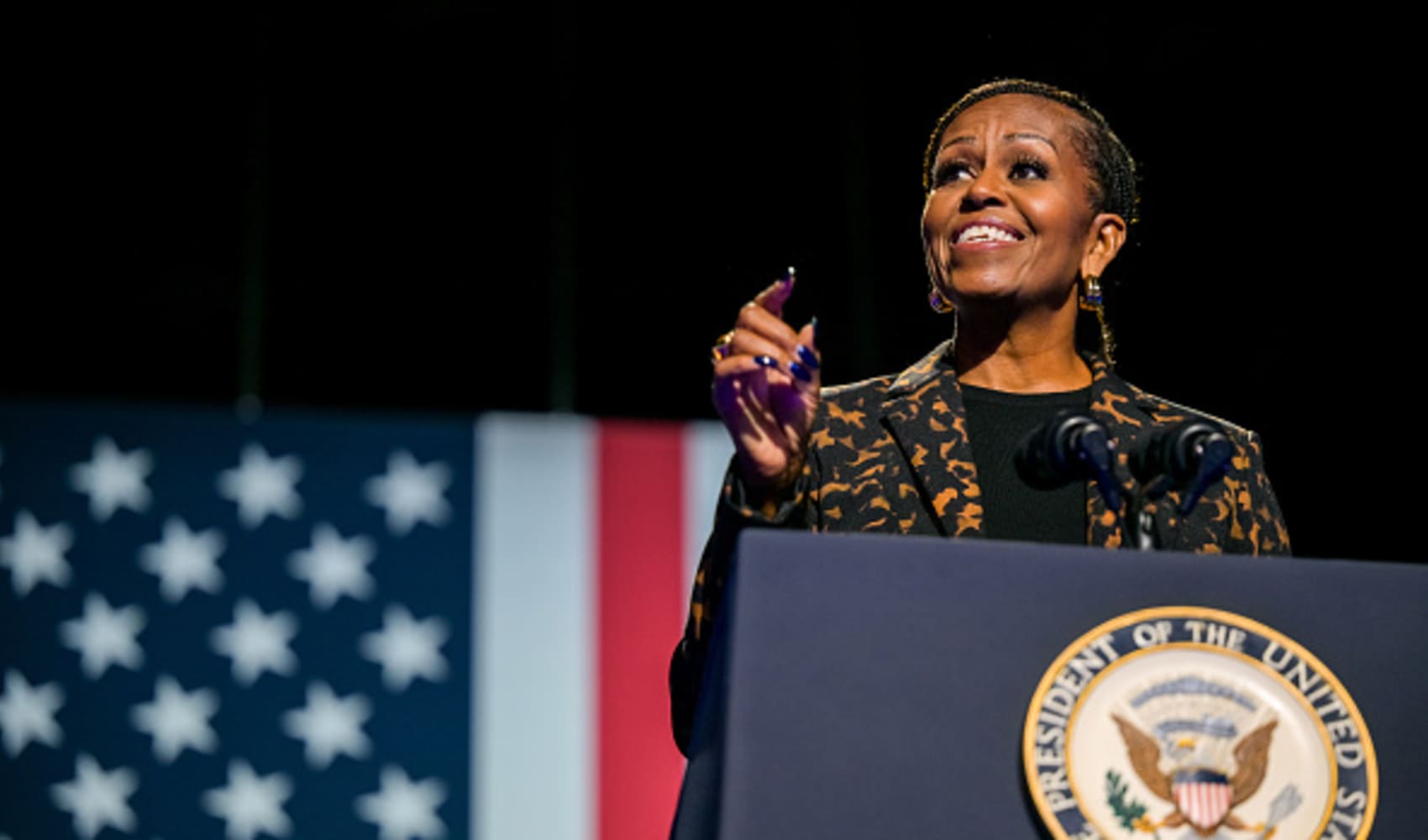 Former first lady Michelle Obama speaks ahead of the arrival of Democratic presidential nominee, U.S. Vice President Kamala Harris during a campaign rally at the Wings Event Center on October 26, 2024 in Kalamazoo, Michigan.