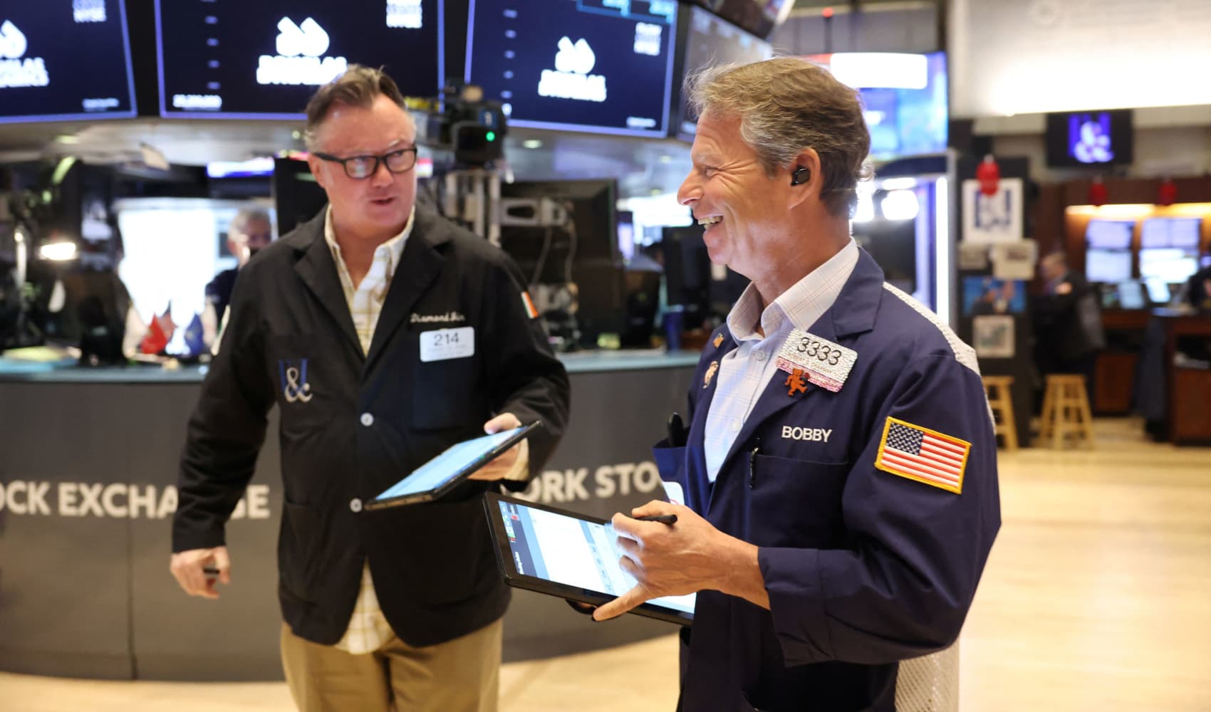 Traders work on the floor at the New York Stock Exchange (NYSE) in New York City, U.S., May 12, 2025.