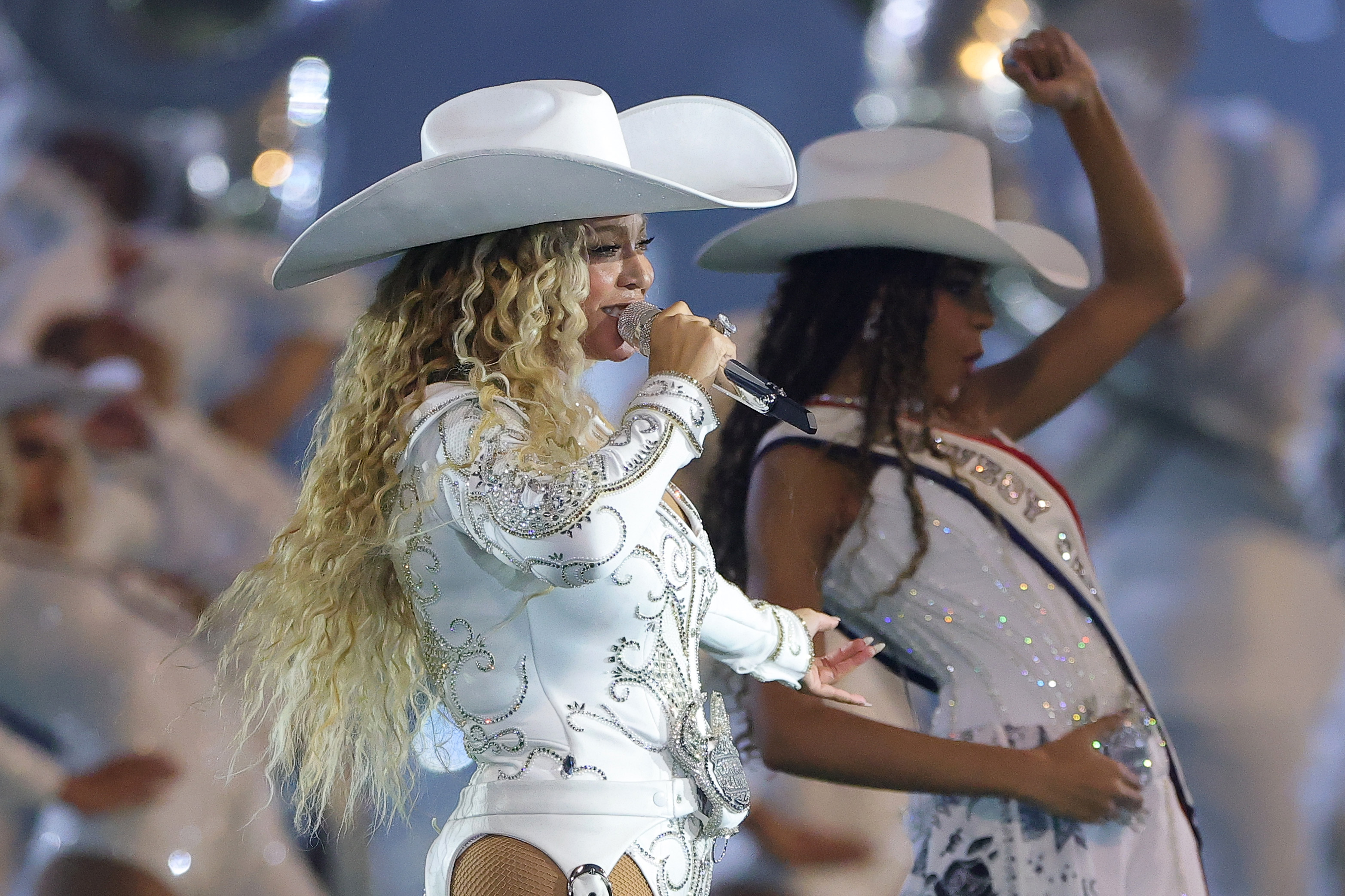 HOUSTON, TEXAS – DECEMBER 25: Beyoncé performs with daughter, Blue Ivy, during the halftime show for the game between the Baltimore Ravens and the Houston Texans at NRG Stadium on December 25, 2024 in Houston, Texas. (Photo by Alex Slitz/Getty Images)